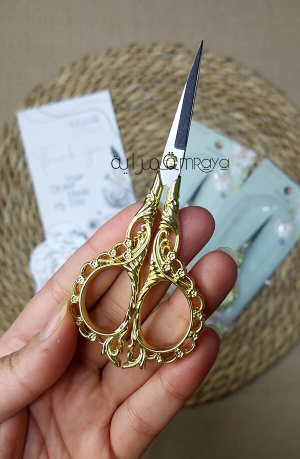 مقص / دهبي - يد مرسومه