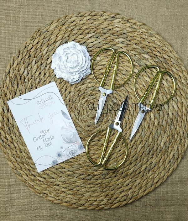 مقص ملكي دهبي